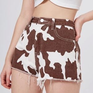 Cow Print Raw Hem Denim Shorts